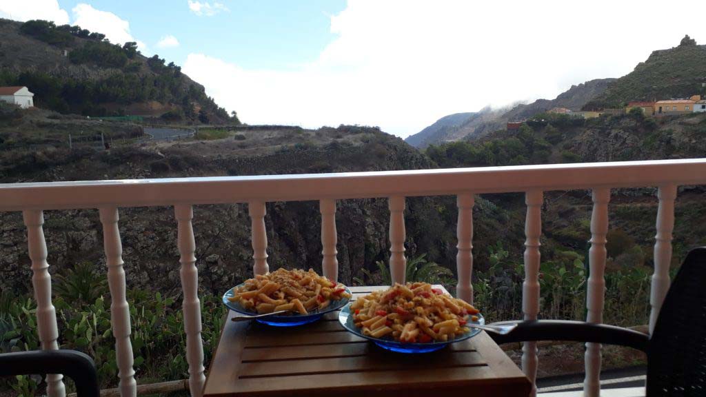 Home cooked meal on the balcony at Apartamentos Plaza Arure