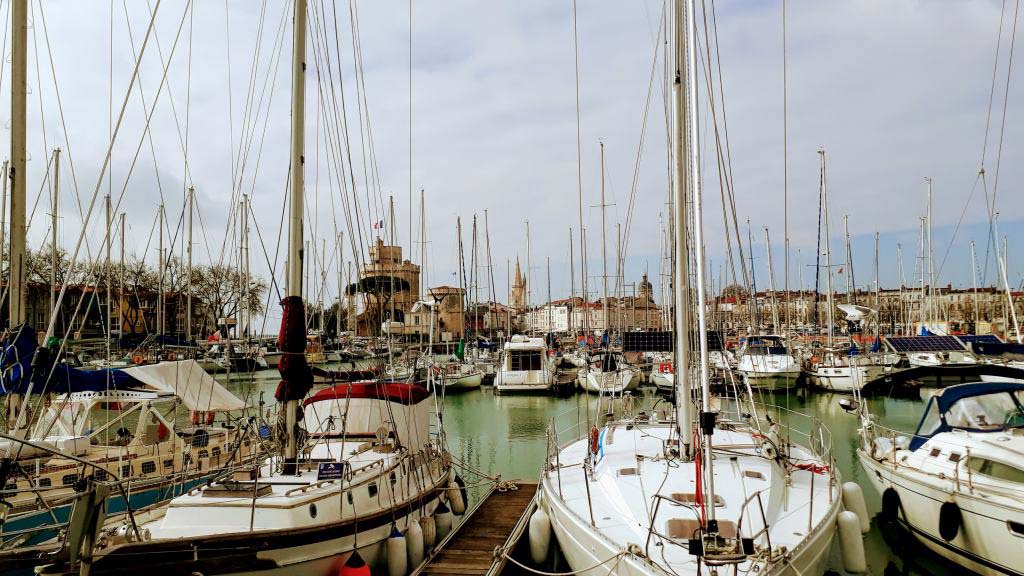 The old harbor (Le Vieux Port) of La Rochelle with the three towers