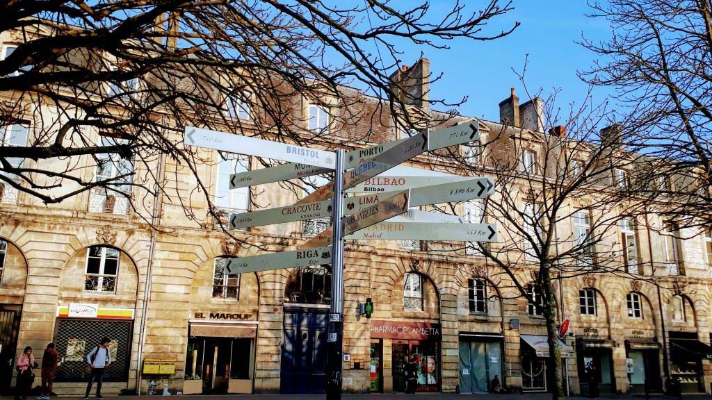 Distance signpost at Place Gambetta in Bordeaux