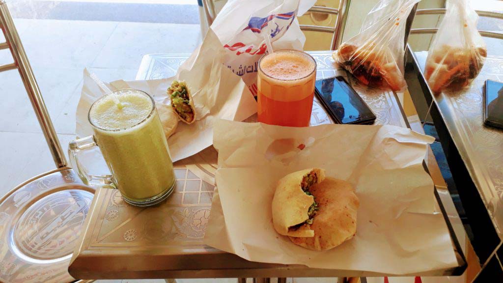 Breakfast in Arabic: Falafel sandwiches and freshly squeezed juices