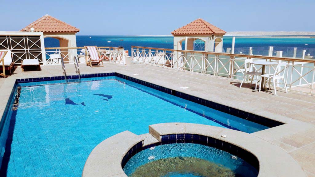 Rooftop pool with view of the Giftun Islands