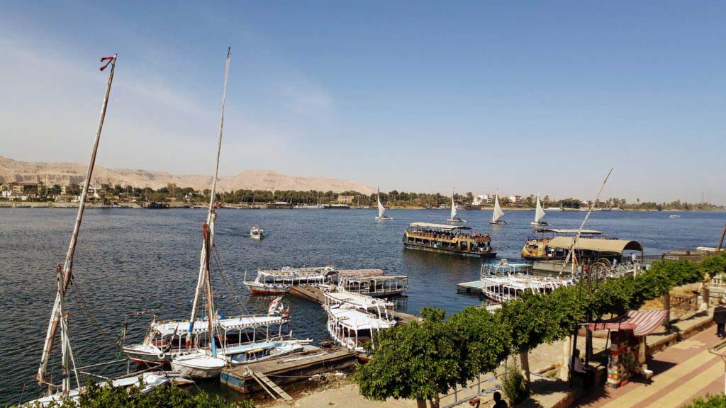 Feluccas (left) in front of the National ferry (right)